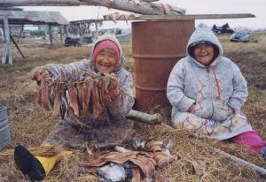 The late Nancy Edwards (left) and Bertha Andrew (right) of Mekoryuk at fish camp on Nunivak Island.