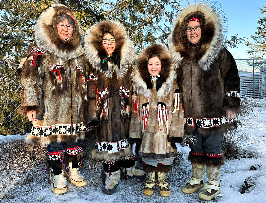Nita Yurrliq Rearden (left) of Kotlik, with her daughter and two granddaughters.